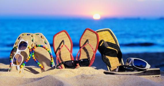 Summer flip flops on the beach